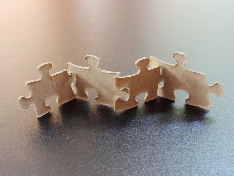 Pieces of the puzzle,The concept of teamwork for business.
